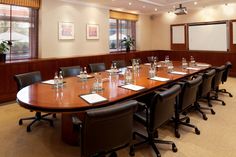 an empty conference room is set up for a meeting