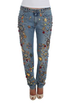 Indulge in the illustrious Italian craftsmanship with these Dolce & Gabbana boyfriend fit jeans, a piece that emanates an aura of enchanted Sicily. With a light blue wash adorned with a dazzling array of crystals forming a heart and roses, these jeans are the epitome of lavish style. The meticulous gold and silver metal detailing enhance the luxurious feel, making them an exclusive addition to your wardrobe. Perfect for those who cherish rare finds and one-of-a-kind fashion statements. Color: Li Jeans Rosa, Dolce And Gabbana Jeans, High Heel Stiefel, Dolce And Gabbana Blue, Boyfriend Fit Jeans, Embellished Jeans, Dolce E Gabbana, Jeans Material, Jeans Boyfriend