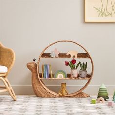 a wicker shelf with books and toys on it