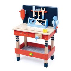 a wooden toy work bench with tools on it