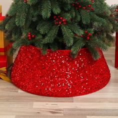 a christmas tree in a red sequin pot