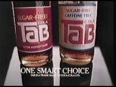 two bottles of tab are sitting side by side on a table with the caption, sugar - free caffe coffee cola