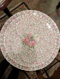 a white plate with pink flowers on it