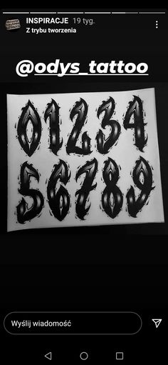 some type of tattoo on a cell phone with the numbers and symbols in black ink