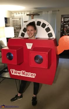 a woman in a costume made to look like a video game maker with her eyes closed