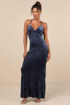 Gorgeous, elegant, and extremely comfortable, the Lulus Immensely Luxe Navy Blue Velour Backless Mermaid Maxi Dress is a dream come true when it comes to special occasion looks! Ultra-soft and plush velvet velour shapes this gorgeous dress that features princess-seamed triangle cups, a V-neckline, and adjustable spaghetti straps that crisscross atop an open back. An empire-style waist tops a figure-flaunting, mermaid-style skirt that falls to a sweeping maxi hem. Fit: This garment fits true to s Elegant Blue Backless Mermaid Dress, Mermaid Maxi Dress, Formal Dresses Gowns, Mermaid Style, A Dream Come True, Empire Style, Style Skirt, Mermaid Fashion, Lulu Dresses