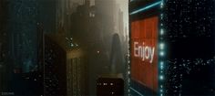 an image of a city at night with the word enjoy written in red on it