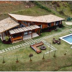 an aerial view of a house with a swimming pool