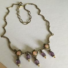 Lovely Delicate Necklace With A Flower Motif. Stones Are Rose Pink And Lavender (Rose Quartz And Amethyst Beads?) Metal Appears To Be An Antique Colored Brass. 15-20 Inches In Length With Attached Extender. Carefully Stored For Years - Never Worn Excellent Vintage Condition Memorial Board, Lavender Rose Quartz, Pink And Lavender, Lavender Roses, Silver Coat, Flower Motif, Funky Jewelry, Amethyst Beads, Lavender Flowers