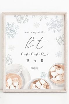 a sign that reads warm up at the hot cocoa bar enjoy with marshmallows