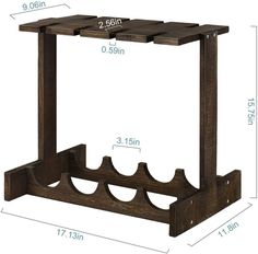 a wooden wine rack with three bottles on it and measurements for the top half of each shelf