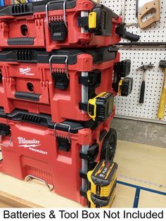 the tools are stacked up on top of each other in this garage storage area with text overlay that reads, batteries & tool box not included