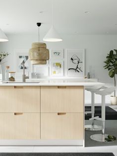 the kitchen is clean and ready to be used as a dining room or living room