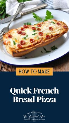 a white plate topped with pizza on top of a wooden table next to a fork and knife