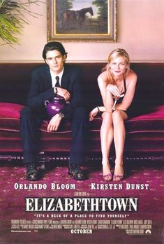 a movie poster for elizabeth town with two people sitting on a couch in front of a painting