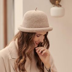 The EMES SHOP hat is detailed with a luxe soft material. Features a solid color. vintage vibe. and bowler hat design.MATERIAL:100%Wool BlendCIRCUMFERENCE MEASUREMENTS: 56-58cm 22-23in Vintage Fall Felt Hat, Beige Winter Fedora Hat, Beige Fedora Winter Hat, Beige Brimmed Felt Hat For Winter, Beige Short Brim Felt Hat For Winter, Beige Felt Hat With Short Brim For Winter, Classic Solid Color Cloche Hat For Fall, Classic Solid Cloche Hat For Fall, Classic Fall Cloche Hat