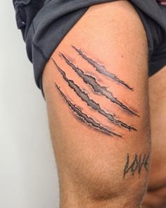 Wolfâs Claw Tattoo Claw Print Tattoo, Claws Tattoo Ideas, Claw Mark Tattoo Women, Tattoo Men Leg Ideas Art Designs, Tiger Scar Tattoo, Lion Claw Tattoo, Guy Tattoos Arm, Claw Tattoo Women, Bear Scratch Tattoo