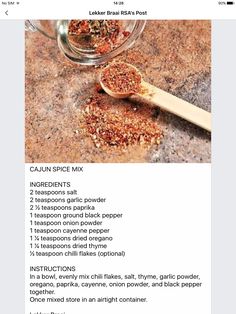 the recipe for cauliflower spice mix is displayed on an iphone screen, next to a wooden spoon