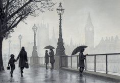 people walking down the street in the rain with umbrellas