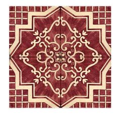 a red and white tile with an intricate design