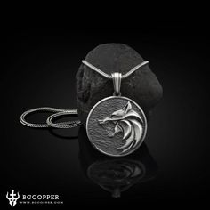 Tin is the fourth precious metal arranged behind platinum, gold, and silver. It is three times the value of copper, Tin can preserve its forever luster!Tin is very suitable for contact with the human body, It is the best jewelry material after gold and silver. A witcher medallion is a silver symbol of the witchers' profession. This magic medallion is given to every young witcher candidate who has passed the Trial of the Grasses.The native Wolf represents strong family bonds, superb communication Witcher Medallion, Native Wolf, Wolf Necklace, Strong Family, Best Jewelry, White Wolf, Tin Can, Precious Metal, Grasses