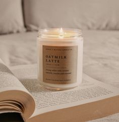 Perfect for book lovers, our Grace + Bloom literary candles are hand-crafted in our sunny shop from natural soy wax with cotton wicks for a clean burn experience, while their modern and minimalist design adds a special touch to any home. With warm, book-inspired scents and a cozy glow, you can create the perfect ambiance for unwinding and curling up with a good book! They also make a thoughtful and sophisticated gift idea for your favorite bookworm.  Light it up for a cozy evening of reading! Corner Coffee Shop, Oatmilk Latte, Corner Coffee, Literary Candles, Candles Dark, House Vibes, Mom Wedding Gift, Candle Gift Box, Summer Candles