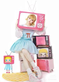 a woman sitting on top of a table holding a tv