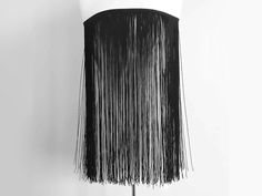 Long Chainette Fringe Fabric - Premium Trim for Costumes, Fashion, and Decor Our long chainette fringe fabric is the perfect addition to any project, offering a luxurious feel and dramatic movement. Ideal for costumes, fashion designs, and home decor, this fringe trim is available in lengths ranging from 12" to 40", allowing you to choose the perfect size for your needs. Available in classic black or white, it provides a versatile option for any color scheme. Features: *Material: High-quality chainette fringe for a soft and luxurious feel *Color Options: Black, White *Length Options and Prices: *40" - $25 per yard *32" - $20 per yard *28" - $18 per yard *24" - $16 per yard *18" - $14 per yard *16" - $12 per yard *12" - $10 per yard Ideal Use: This versatile chainette fringe is ideal for va Fringe Fabric, Fringe Skirt, Decor Black, Fashion Designs, Fringe Trim, Fabric Trim, Black Decor, Decor Project, Color Scheme