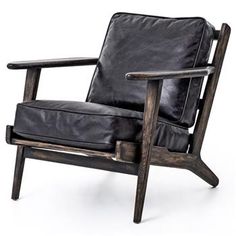 a black leather chair sitting on top of a wooden frame