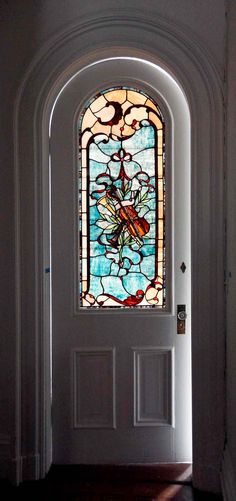 a door with a stained glass window in it