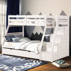 a white bunk bed sitting on top of a wooden floor next to a blue rug