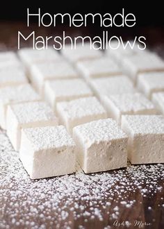 homemade marshmallows on a wooden table with text overlay that reads homemade marshmallows