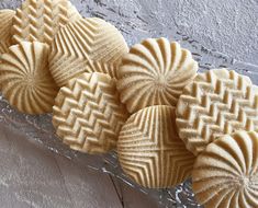 some cookies are sitting on a glass plate