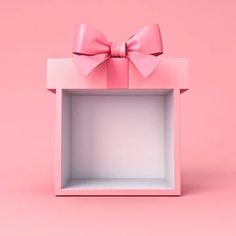 an open pink gift box with a bow on the top and bottom, against a pink background