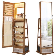 an open wooden medicine cabinet next to a mirror with its doors open and shelves on both sides