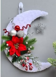 a christmas wreath hanging on the side of a wall