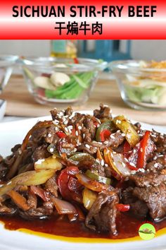 a white plate topped with meat and vegetables