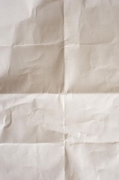 a piece of white paper that has been folded