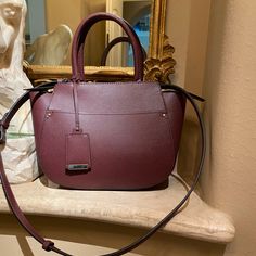 Brand New Zara Burgundy Bag No Tag But Never Used Zara Travel Satchel With Adjustable Strap, Zara Satchel With Adjustable Strap, Zara Satchel With Adjustable Strap For Everyday, Modern Zara Bags For Daily Use, Modern Zara Bags, Zara Crossbody Satchel With Removable Pouch, Zara Satchel Shoulder Bag For Everyday, Zara Satchel With Removable Pouch For Travel, Zara Top Handle Shoulder Bag For Everyday Use