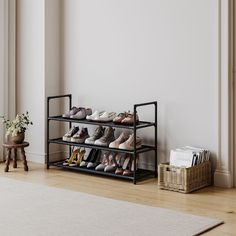 there is a shoe rack with many pairs of shoes on it