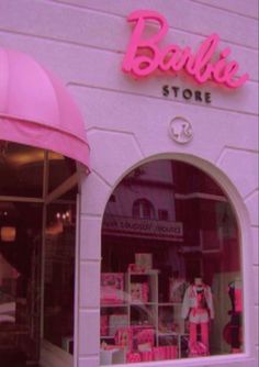 a pink store front with the word barbie on it