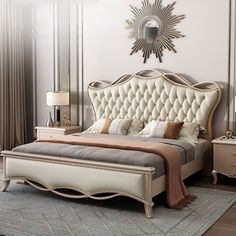 a bedroom with a bed, dresser and mirror on the wall above it's headboard