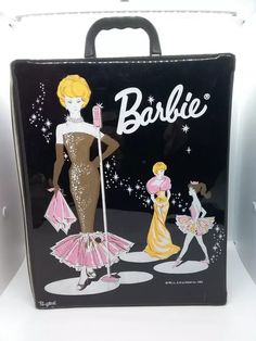 a black bag with barbie dolls on it