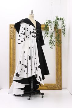 a mannequin dressed in black and white clothing