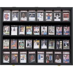 a display case filled with lots of baseball cards and pictures on the front of it