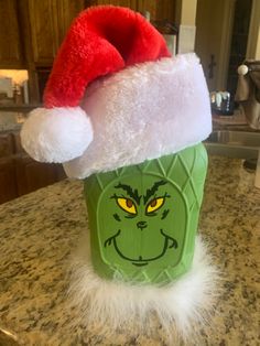 Crown large bottle painted as Grinch Decorated Crown Royal Bottles, Crown Royal Bottle Crafts Diy Halloween, Christmas Liquor Bottle Crafts, Grinch Bottle Crafts, Grinch Wine Bottle Diy, Diy Crown Royal Bottle Projects, Crown Bottle Crafts, Liquor Bottle Crafts Diy Ideas, Whisky Bottle Crafts