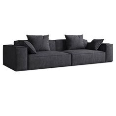 a black couch with pillows on it