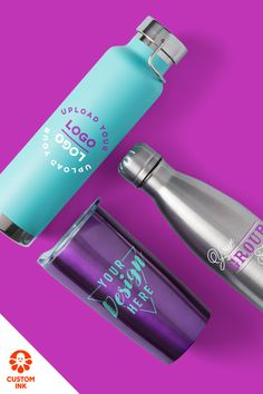 two stainless steel water bottles on a purple background