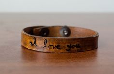 Hey, I found this really awesome Etsy listing at https://www.etsy.com/listing/257614558/skinny-i-love-you-leather-cuff-with Diy Leather Projects, Leather Jewellery, Jewellery Ideas, Mens Leather Bracelet, Unisex Bracelets, Leather Cuffs Bracelet, Leather Projects, Leather Wrap Bracelet, Leather Diy