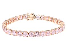 Bella Luce® pink diamond simulant 37.47ctw round, Eterno™ 18k rose gold over sterling silver tennis bracelet. Measures approximately 7.25" - 8" L x 0.25" W and has a hidden box clasp closure. Diamond equivalent weight is 22.70ctw. Pink And Gold Bracelets, Pink Jewelry Bracelets, Pink Diamond Tennis Bracelet, Gold And Pink Bracelet, Pink And Gold Bracelet, Pink Prom Jewelry, Pink Prom Accessories, Gold And Pink Jewelry, Pink And Gold Jewelry